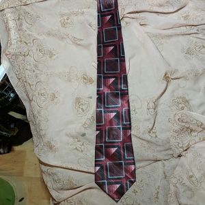 100% silk Arrow tie in Reds and black with grey
